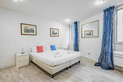 Letto o letti in una camera di GuestHost - Sant'Ambrogio Central Apt - Your Florence Hideaway