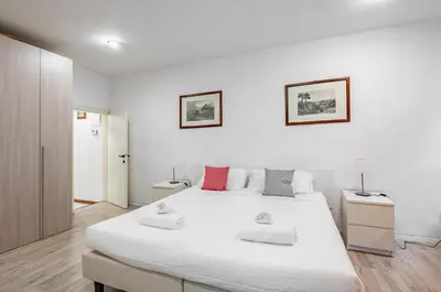 Letto o letti in una camera di GuestHost - Sant'Ambrogio Central Apt - Your Florence Hideaway