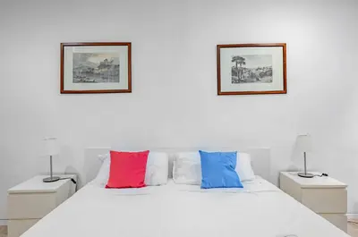 Letto o letti in una camera di GuestHost - Sant'Ambrogio Central Apt - Your Florence Hideaway