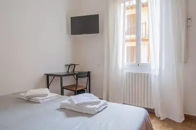 Letto o letti in una camera di Paraiso