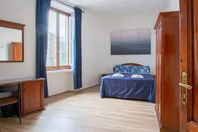 Letto o letti in una camera di Paraiso