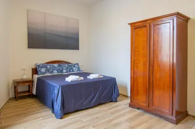 Letto o letti in una camera di Paraiso