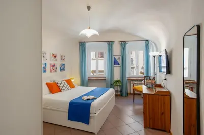 Letto o letti in una camera di La Torretta - Tintori apt