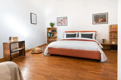 Letto o letti in una camera di Spacious family flat S. Spirito 8 sleeps