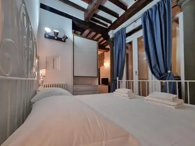 Letto o letti in una camera di Borgo Allegri Apartment