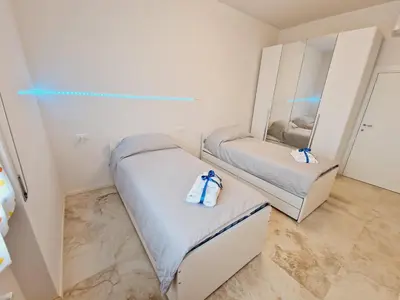 Letto o letti in una camera di Casa Fiorenza