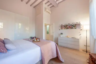Letto o letti in una camera di Fuori le Mura di San Frediano - Flo Apartments