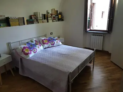 Letto o letti in una camera di Appartamento Santo Stefano