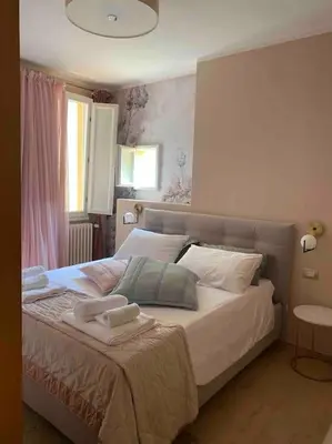 Letto o letti in una camera di Palazzo Vecchio La Nuvola