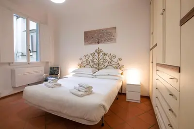 Letto o letti in una camera di Macci Studio by Mamo Florence