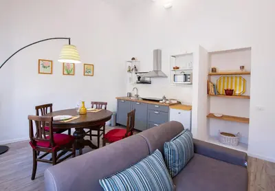 Cucina o angolo cottura di Borgo Santa Croce Apartment by Mamo Florence