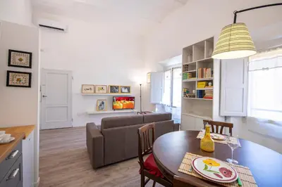 Area soggiorno di Borgo Santa Croce Apartment by Mamo Florence