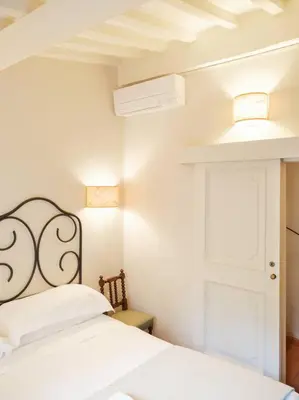 Letto o letti in una camera di Casa Attilia - Green cozy corner on the city walls