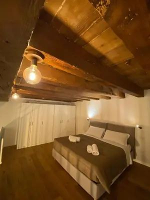 Letto o letti in una camera di signoria flat 5* centro storico