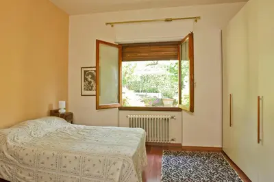Letto o letti in una camera di Residenza Ruggini