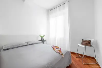 Letto o letti in una camera di Casa tua Santo Spirito