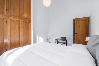 Letto o letti in una camera di Casa tua Santo Spirito