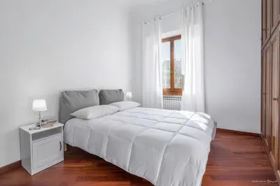 Letto o letti in una camera di Casa tua Santo Spirito