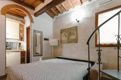 Letto o letti in una camera di Apartment San Frediano