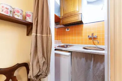 Cucina o angolo cottura di GuestHost - La Casa di Poldina - Santo Spirito Sweet Studio