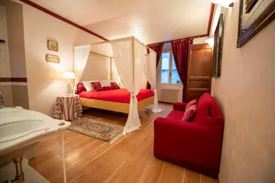Letto o letti in una camera di Peruzzi Luxury Apartment by Mamo Florence