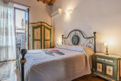 Letto o letti in una camera di Firenze Rentals Mini Suite Corso