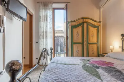 Letto o letti in una camera di Firenze Rentals Mini Suite Corso