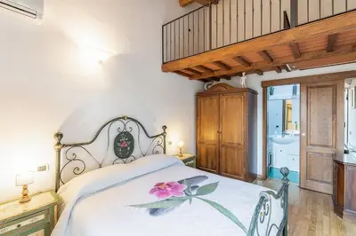 Letto o letti in una camera di Firenze Rentals Mini Suite Corso