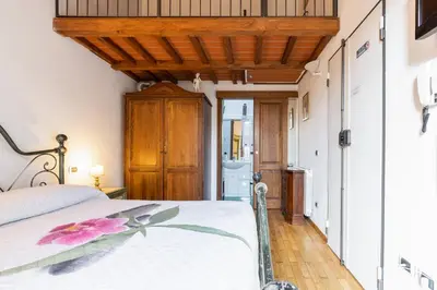Letto o letti in una camera di Firenze Rentals Mini Suite Corso