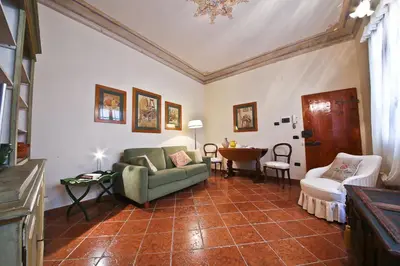 Area soggiorno di Vigna Nuova Laura by FlorenceHospitality com