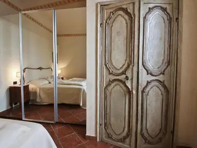 Letto o letti in una camera di Vigna Nuova Laura by FlorenceHospitality com