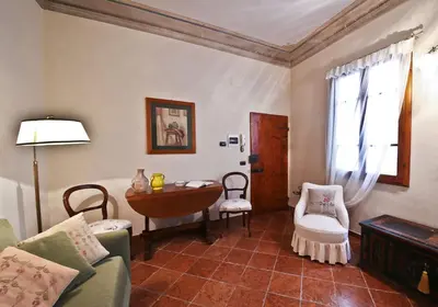 Area soggiorno di Vigna Nuova Laura by FlorenceHospitality com