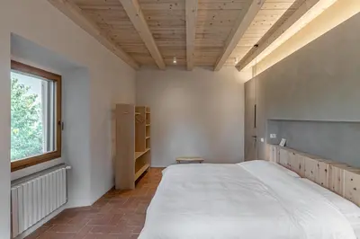 Letto o letti in una camera di La Casa Rosa bnb