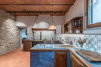 Cucina o angolo cottura di La Casa Rosa bnb