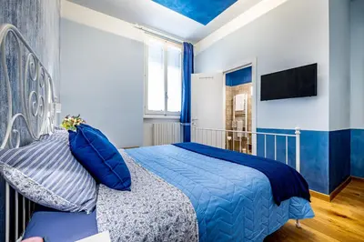 Letto o letti in una camera di Sabry Home Florence Guest House Affittacamere
