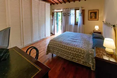 Letto o letti in una camera di Casa Quaratesi