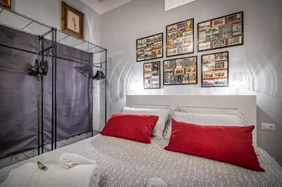 Letto o letti in una camera di San Paolino 24 Hours