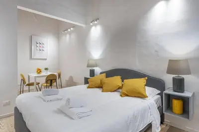 Letto o letti in una camera di UNYCA - Central Studio in Florence 2