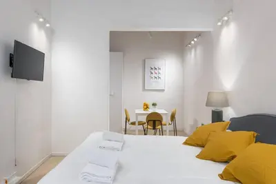 Letto o letti in una camera di UNYCA - Central Studio in Florence 2
