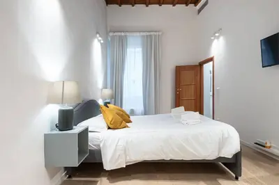 Letto o letti in una camera di UNYCA - Central Studio in Florence 2