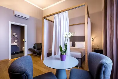 Letto o letti in una camera di Residenza D'Epoca Al Numero 8