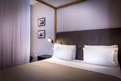 Letto o letti in una camera di Residenza D'Epoca Al Numero 8