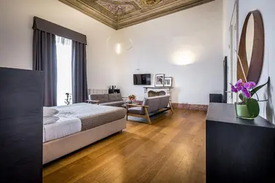 Letto o letti in una camera di Residenza D'Epoca Al Numero 8