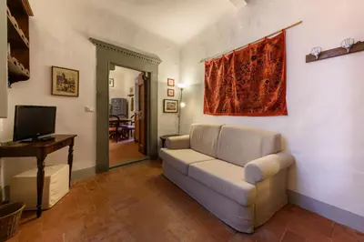 TV o dispositivi per l'intrattenimento presso Casa torre via de' Nerì by Mmega