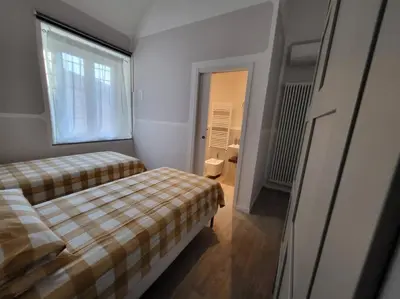 Letto o letti in una camera di La Casa di Nella
