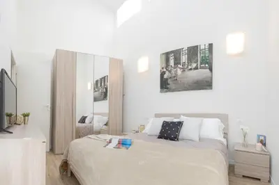 Letto o letti in una camera di Cittadella Apartment by Mamo Florence