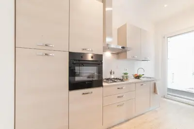 Cucina o angolo cottura di Cittadella Apartment by Mamo Florence