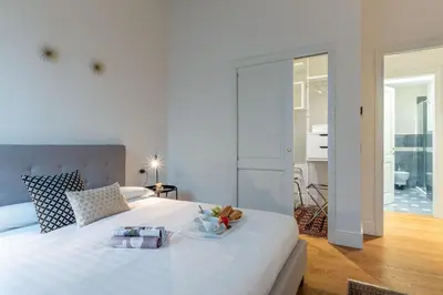Letto o letti in una camera di Style In Florence - Belcanto Villas