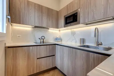 Cucina o angolo cottura di Aleardi Roof Apartment by Mamo Florence
