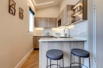 Cucina o angolo cottura di Aleardi Roof Apartment by Mamo Florence